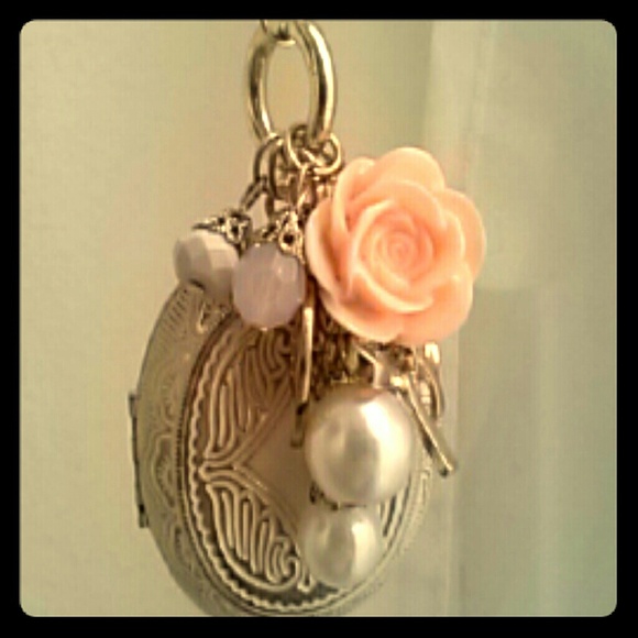 Locket necklace with charms