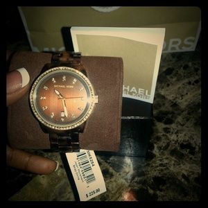 Authentic Michael Kors ladies watch. BRAND NEW!!