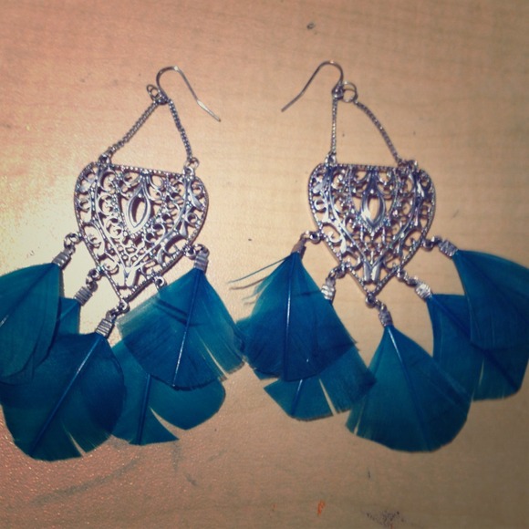 Feathered earrings.