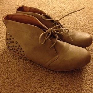 Shoes with spikes/studs.