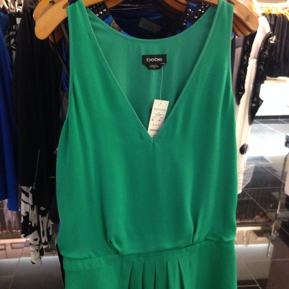 SOLD Bebe green dress