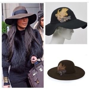 Floppy feather accent brim felt hat.