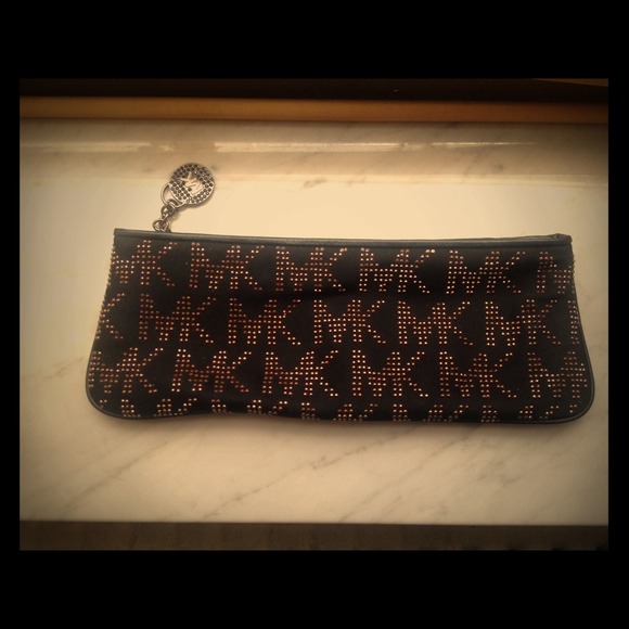 Authentic new Michael Kors clutch