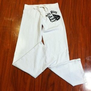 White juicy couture sweatpants and pink jacket