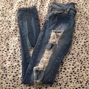 Distressed skinny jeans.