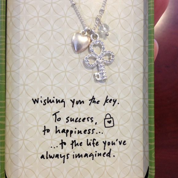 Silver necklace with key charm