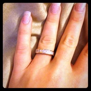 Princess cut silver channel ring