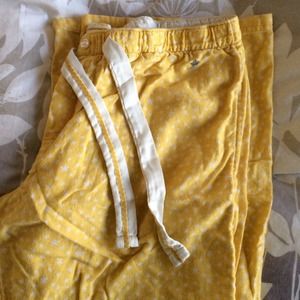 Yellow sleepy pants with white stars.