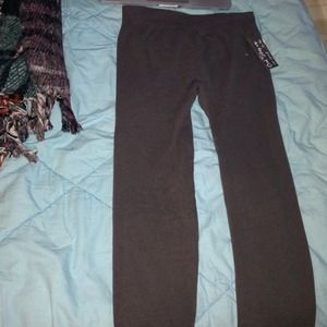 Grey never worn leggings. 45% cotton 30% nylon.