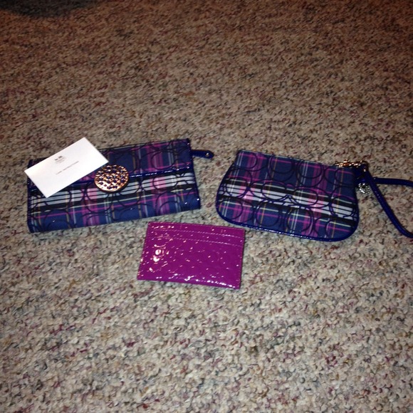 Coach- plaid wallet, wristlets. Holding
