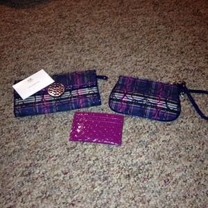 Coach- plaid wallet, wristlets. Holding