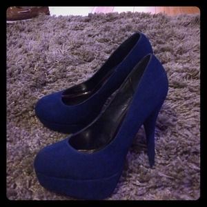 Navy blue platform heels.