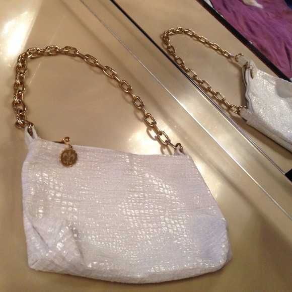Boa style white designer bag with a gold chain