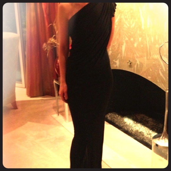 Designers one shoulder gown in black.