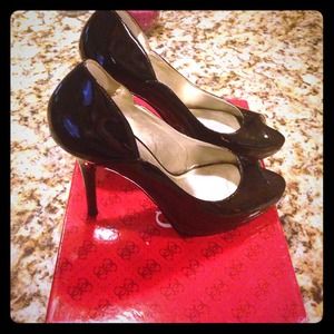 Black patent pep toe pumps