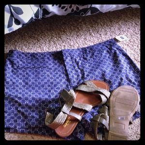 Gap shorts and green sandals.