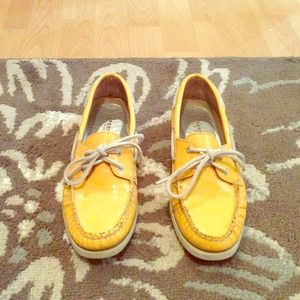 Yellow Sperry top-siders.