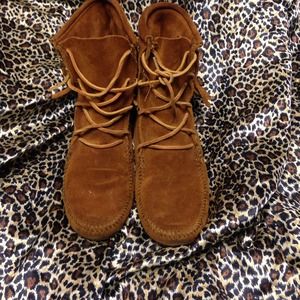 Brown fringe moccasins