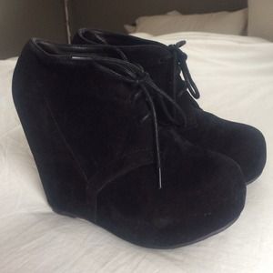 5.5 black faux suede wedge booties