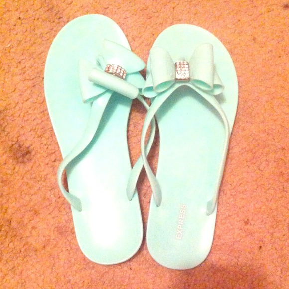Turquoise express flip flops
