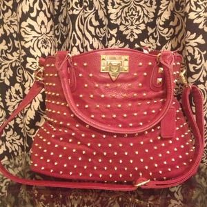 Red studded Steve Madden bag