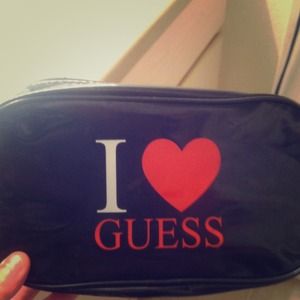 Never used Guess cosmetic bag!