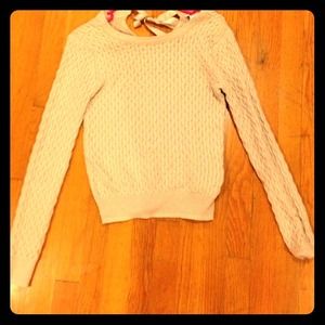 Cute sweater with now on the back