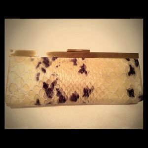 **SOLD ON EBAY**CalvinKlein python embossed clutch