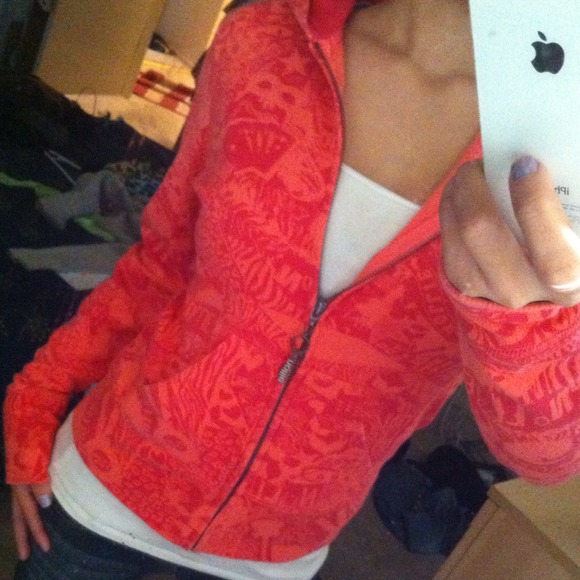 Orange and pink Nollie zip up. Never been worn