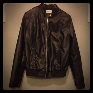 Faux leather black jacket and grey maxi dress.