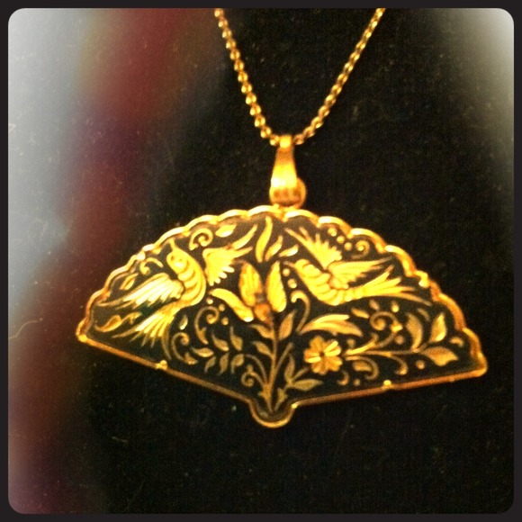 Vintage fan pendant on chain.