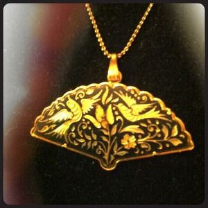 Vintage fan pendant on chain.