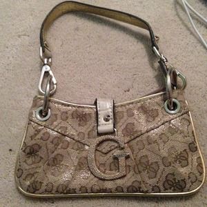 Gold Guess wristlet!