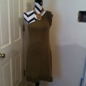 Olive green one shoulder dress.