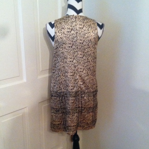 Silky type sheath dress with decorative bottom. - Picture 2 of 3