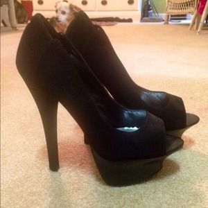 Tall, jet black, open toed stiletto pumps!