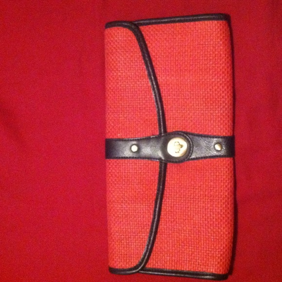 Avenue red and brown straw quilted clutch