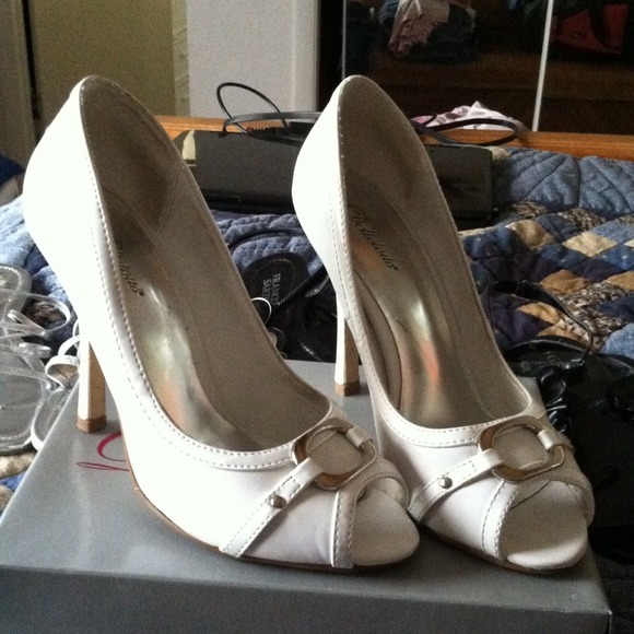 White peep toe heels with rectangle silver buckle