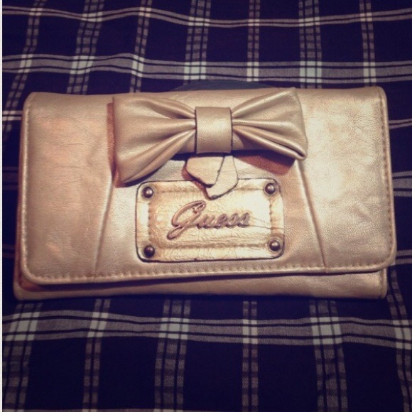 Adorable silver gold guess bow wallet