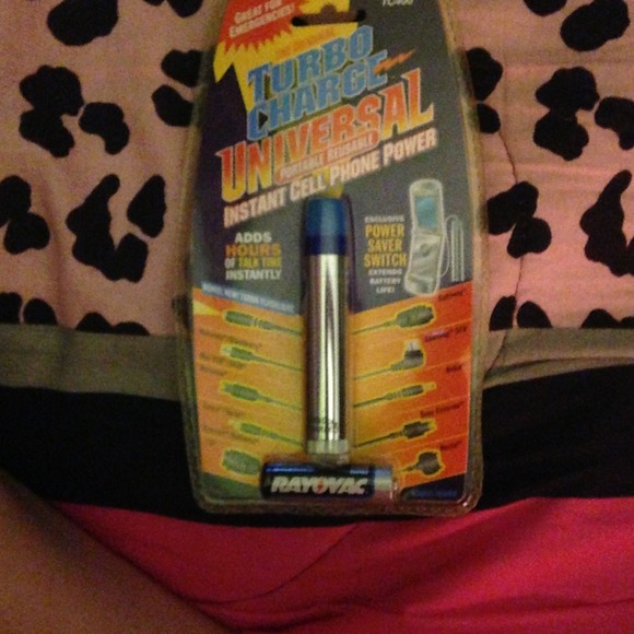 Brandnew never opened universal charger  w/battery