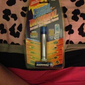 Brandnew never opened universal charger  w/battery