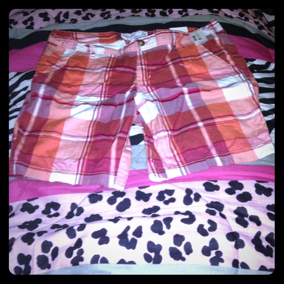 Brand-new with tags orange Bermuda shorts
