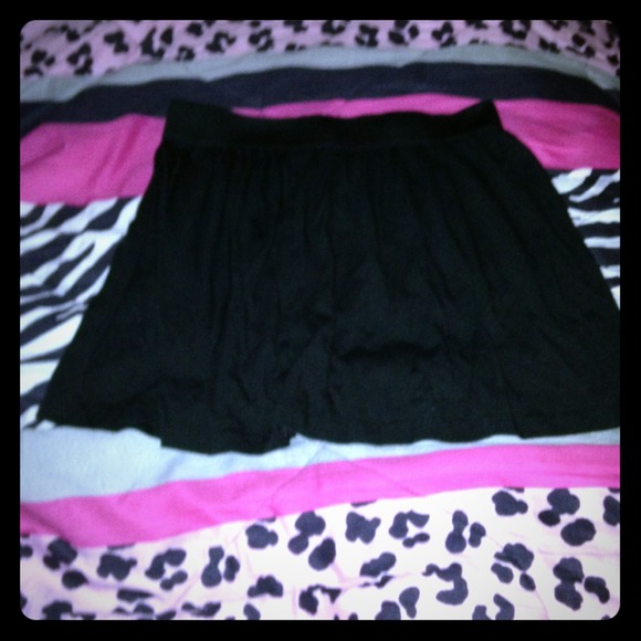 Short black flowing skirt