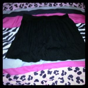 Short black flowing skirt
