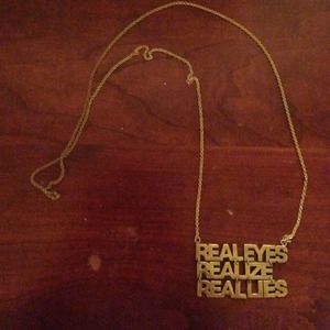 Cute handmade necklace! Real eyes. Realize. Real