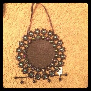 Earring and necklace holder