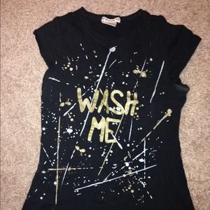 Black Tshirts that says "Wash Me"