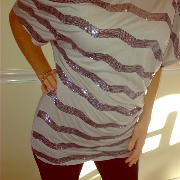 Off the shoulder cotton tee.