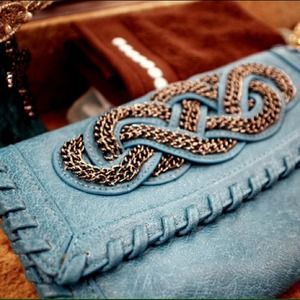 Edgy Chain Embellished Leather Clutch