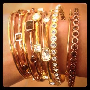 Gold and gem encrusted bangles 💜